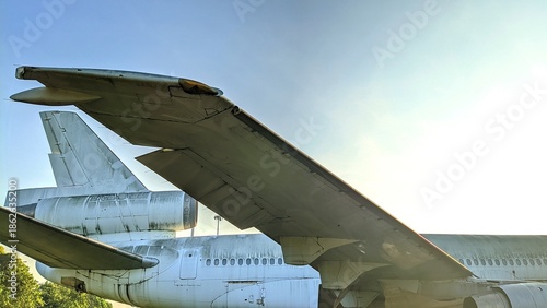 Abandoned old airplane showcasing vintage aviation design, historic travel era, mechanical details, and nostalgic aeronautical atmosphere