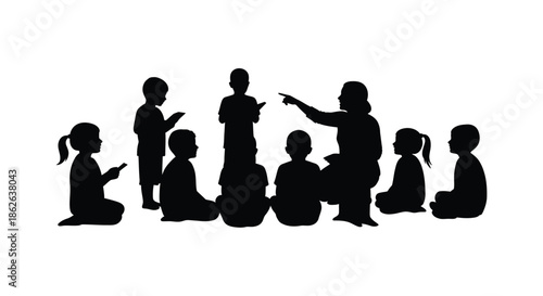 A group of children and an adult interacting captured in a striking black silhouette