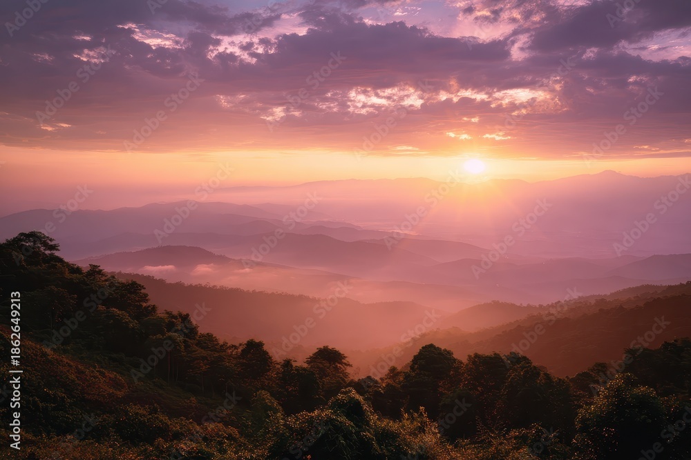 Obraz premium Majestic sunrise over Doi Inthanon National Park showcasing vibrant sky colors and breathtaking mountainous landscape