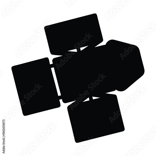 Silhouette of a studio fresnel light with barn doors for lighting control