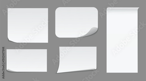 Collection of various white paper notes with curled corners.