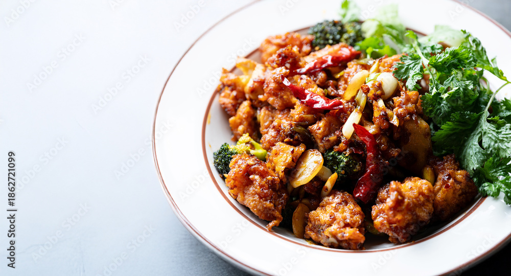 Fototapeta premium Spicy Seasoned Chicken on a Plate