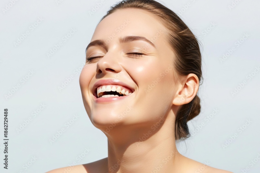 Obraz premium Beautiful woman smiling with closed eyes feeling happy