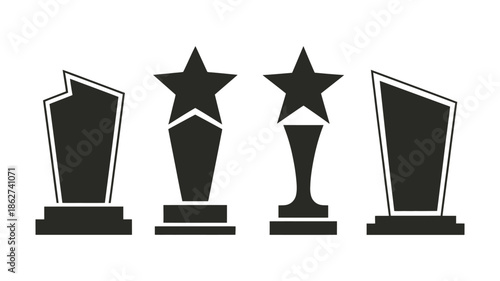 A collection of black award trophies and star shaped recognition symbols