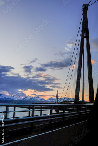 bridge over the sea with mountain landscape 
