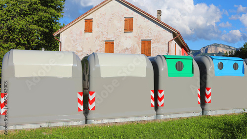 four large bins for separate collection uraban solid waste city street