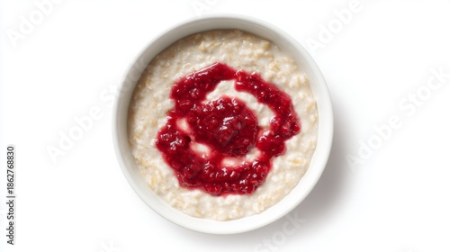 Wallpaper Mural In a cozy kitchen, a bowl of creamy porridge sits invitingly, adorned with a swirl of rich berry sauce, promising a warm and hearty start to the day, perfect for sunrise comfort Torontodigital.ca