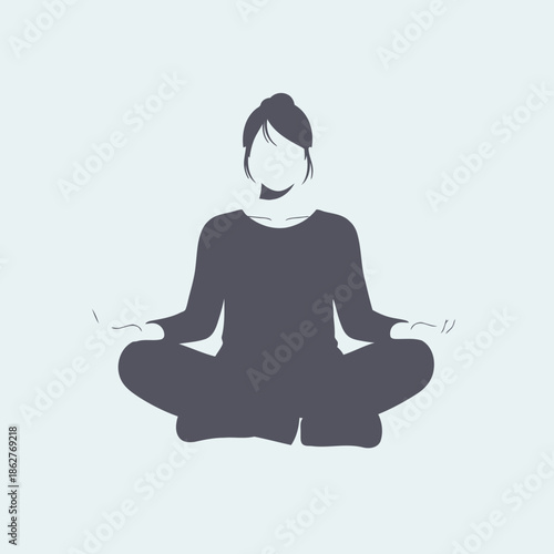 A serene woman sitting in lotus position