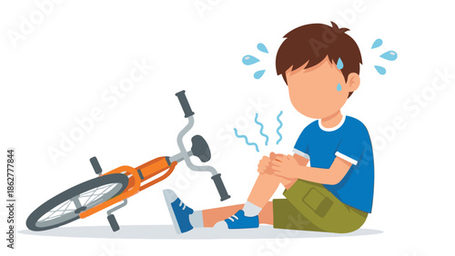 Little boy crying in pain after falling off his bicycle and injuring his knee
