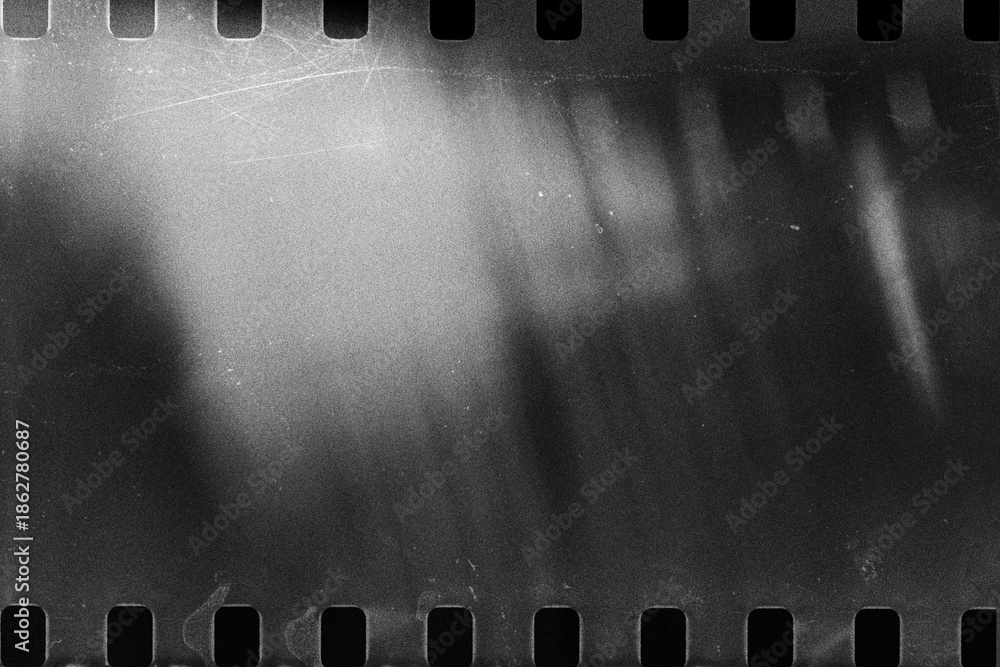 Fototapeta premium Old film texture with scratches, noise and light leaks. Realistic overlay film texture in black-white, dust and grain. Distressed retro movie or photo negative effect of cinema nostalgia.