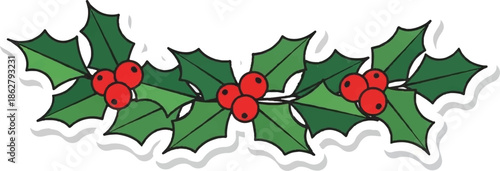 A festive holly garland with vibrant green leaves and bright red berries