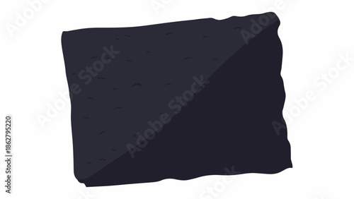 A dark, textured block with a rough edge and a diagonal division