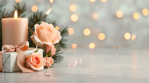 Elegant gift box with roses and lit candle, soft bokeh lights background