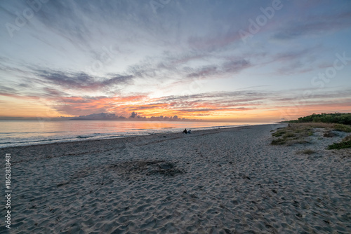 sunrise romantic couple on Corsican coast near Bastia Etang de Biguglia Camping San Daminao Beachside Corse