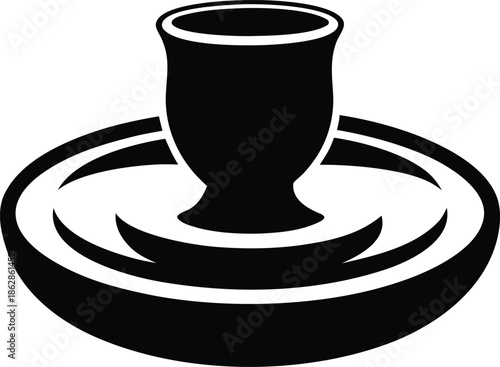 Elegant Black Silhouette of a Traditional Egg Holder Resting on a Flat Circular Dishware