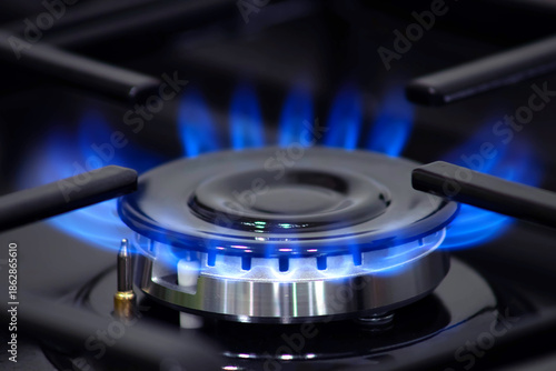 Gas is burning on the stove. Close up. Gas supply problems. Gas crisis. Heat in homes.