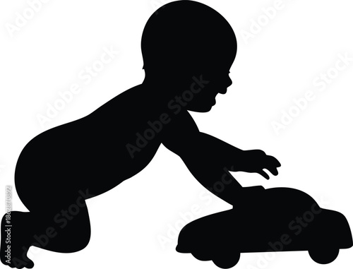 Little baby infant joyfully crawling and playing with a small toy car on the floor