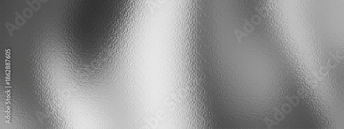 Silver foil texture with gradient shimmer creates an elegant metallic background perfect for luxury design projects and modern digital presentations with glossy reflective surface.