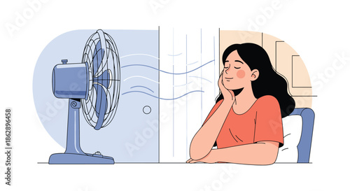 Young woman in a peach shirt sitting at a table and enjoying the cool breeze from a large electric fan in a minimalist style.