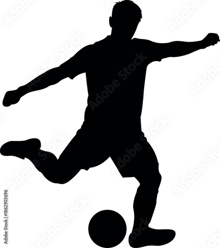 A silhouette of a soccer player kicking the ball powerfully