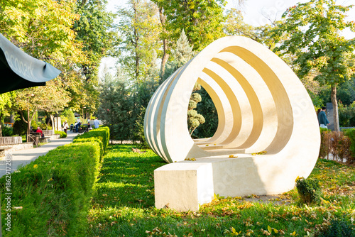 Modern art sculpture in sunny city park