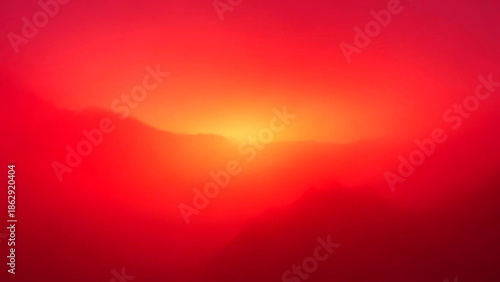 Vibrant Sunset over Silhouetted Mountains