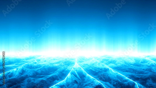 A radiant glow illuminates the ocean surface from beneath, creating a vibrant display of electric blue hues from an aerial viewpoint