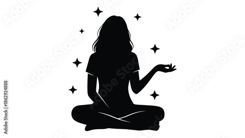 Silhouette of a woman meditating with sparkling stars surrounding her