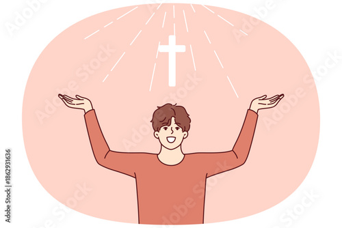Man with christian cross above head rejoices at light coming from heaven and calls to visit church for prayers. Christian guy believes in miracle obtained by attending religious masses.
