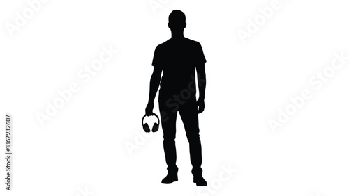 Silhouette of a man holding headphones against a plain white background