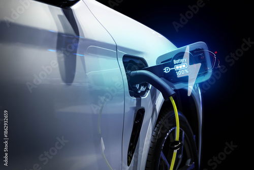 Power cable pump plug in charging power to electric vehicle EV car.