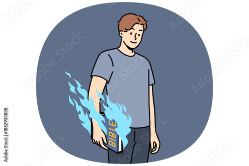 Man holds bible and feels magical energy emanating from religious book with old testament or prayers. Burning bible in hands of guy who wants to destroy symbol of catholicism or christianity