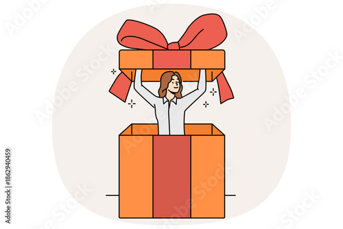 Tiny woman inside gift box with bow, to congratulate store customers or business partners. Girl looks out of present intended for birthday gift or holiday party with surprise for guests