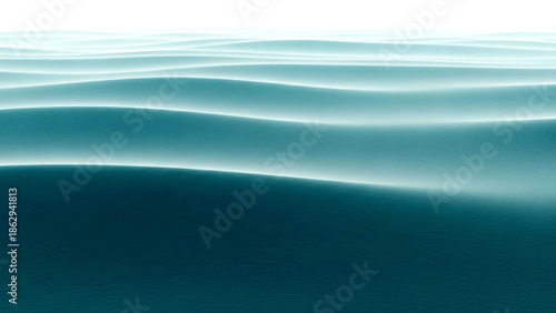 Serene ocean waves gently lap against the sandy beach at sunrise from a low viewpoint