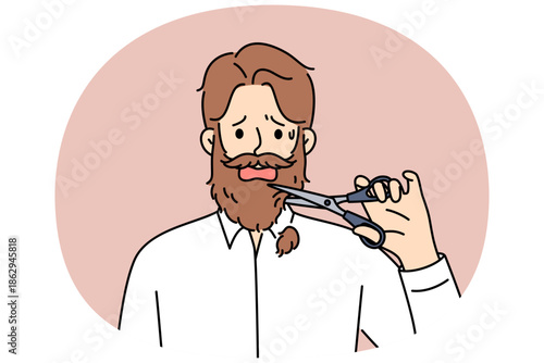 Man cuts off own beard with scissors because of appearance requirements at new job. Adult depressed guy is stressed due to need to get rid of beard or lack of money to go to barbershop.