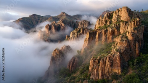 Misty mountain peaks at dawn