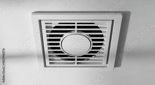 Close-up of a White Bathroom Ventilation Fan on the Ceiling.