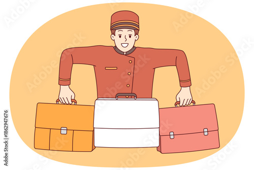 Man concierge works at hotel, helping to carry luggage into room and receiving tips from guests. Happy concierge or bellboy dressed in red uniform smiling broadly, enjoying favorite job