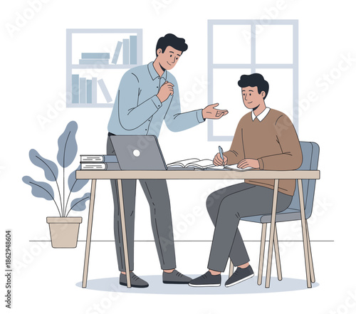 Mentor helping student with laptop and notebook