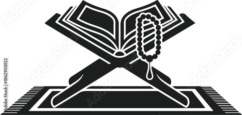 An open holy book with prayer beads resting on a prayer rug