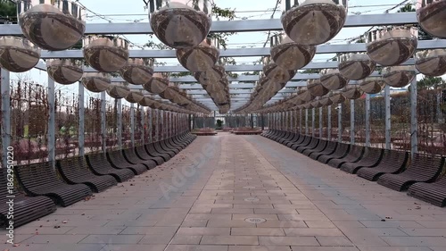 Wallpaper Mural A walk through a picturesque city park in Krasnodar, Russia. Modern architecture, lush greenery, and captivating views. Habitat. Man and nature. Urban geometry Torontodigital.ca