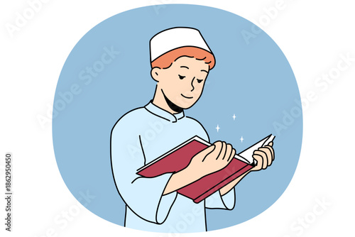 Muslim boy reads koran, comprehending basics islamic religion, dressed in traditional turkish headdress. Muslim devout child studies book with life story of prophet muhammad during holy month ramadan
