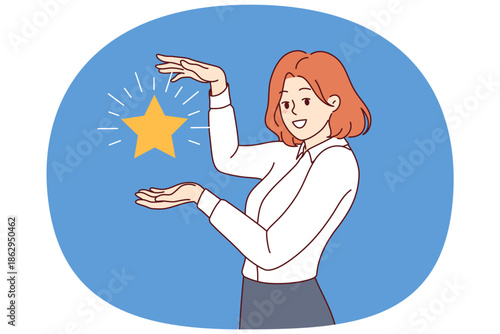 Business woman, best employee of month, received star confirming excellent skills to achieve tasks. Ambitious girl shows badge of distinction received by business after mystery shopper purchase