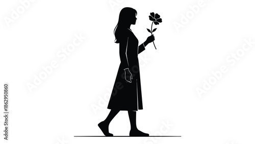 Silhouette of a woman holding a single flower a poignant and simple image