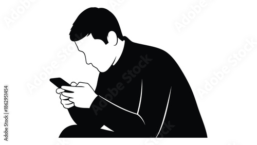 A silhouette of a person engrossed in their smartphone looking downward