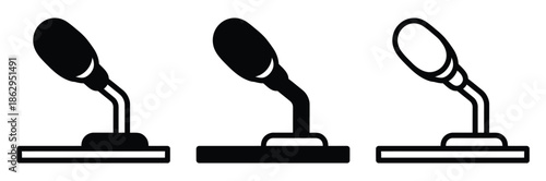 Three black and white microphone icons on stands,Microphone icon set. Mic icons. Icons podcast, voice recognition and record. Vector Illustration.
