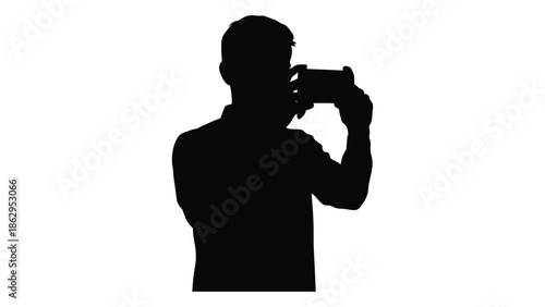Silhouette of a photographer capturing a moment with a camera