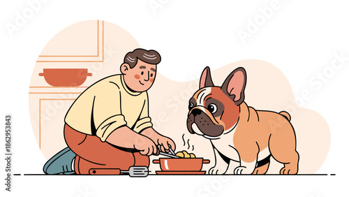 Man feeding his pet dog in a domestic kitchen environment from a kneeling viewpoint
