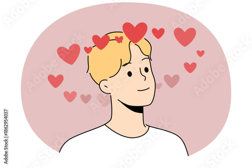 Man in love feels sympathy for girlfriend and smiles, fantasizing about future date or wedding. Guy is in romantic mood after going on date with girl or receiving congratulations on valentine day