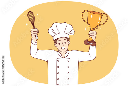 Man chef cook celebrates victory in professional culinary tournament, holds golden cup and whisk in hands. Restaurant chef in white uniform and hat won speed-cooking delicacy competition